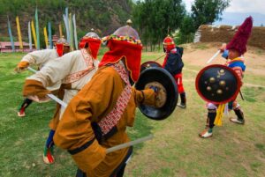 Männer bei den lokalen Spielen in Bhutan